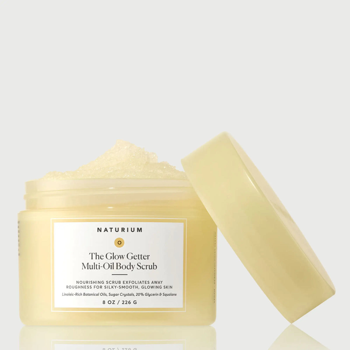 the-glow-getter-multi-oil-body-scrub-j2 NATR-40028-GlowGetter-Multi-Oil-Body-Scrub-Front-CapOff-bonebkgd.webp